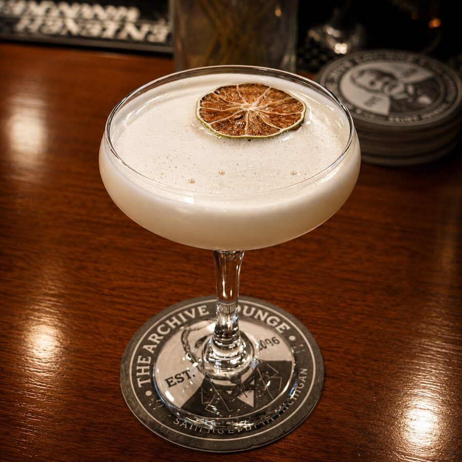 Plot Twist cocktail at The Archive Lounge — Lavender Gimlet