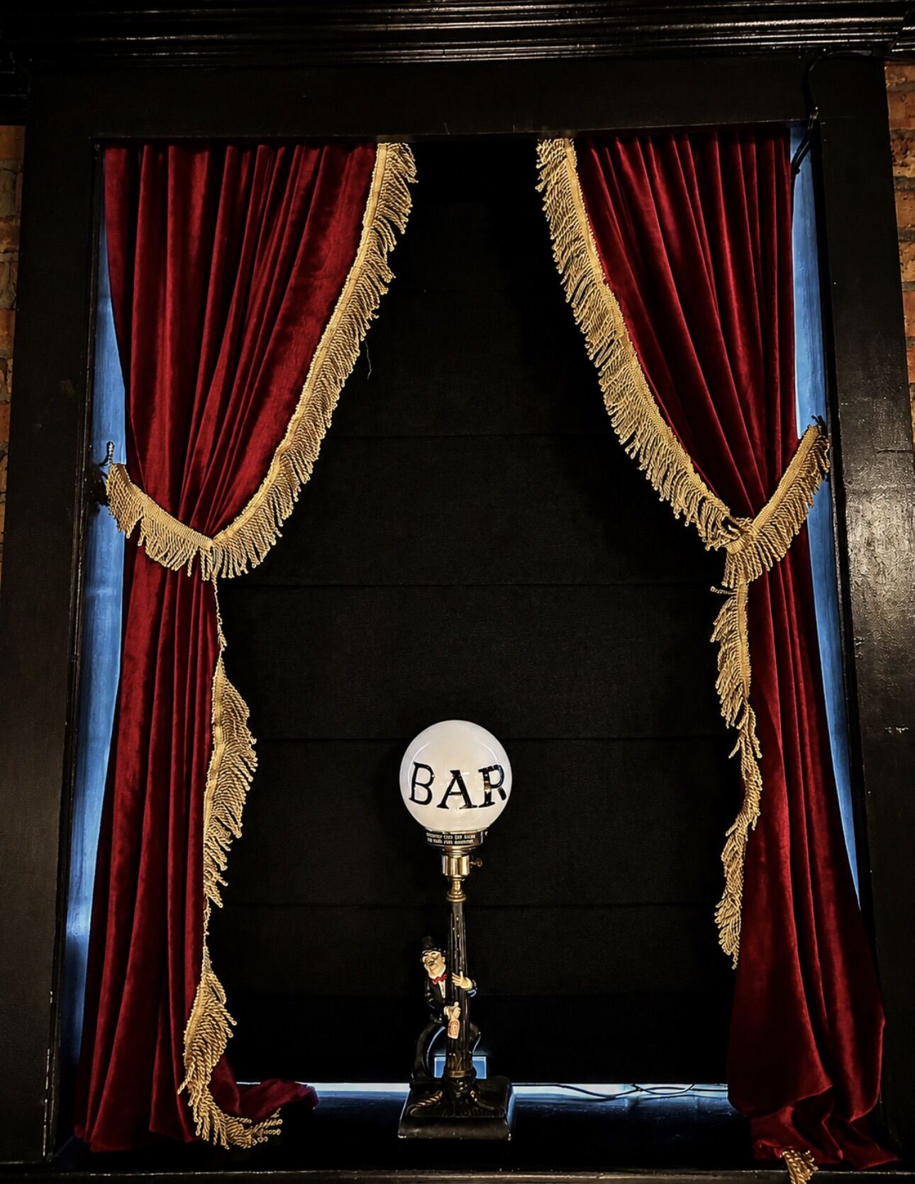 The BAR marquee in red fringe curtains