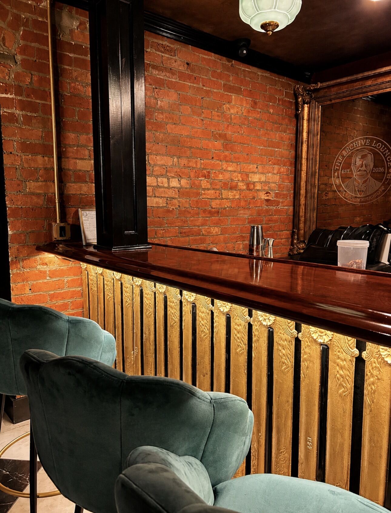 The bar front built from restored 1904 cast-iron radiators